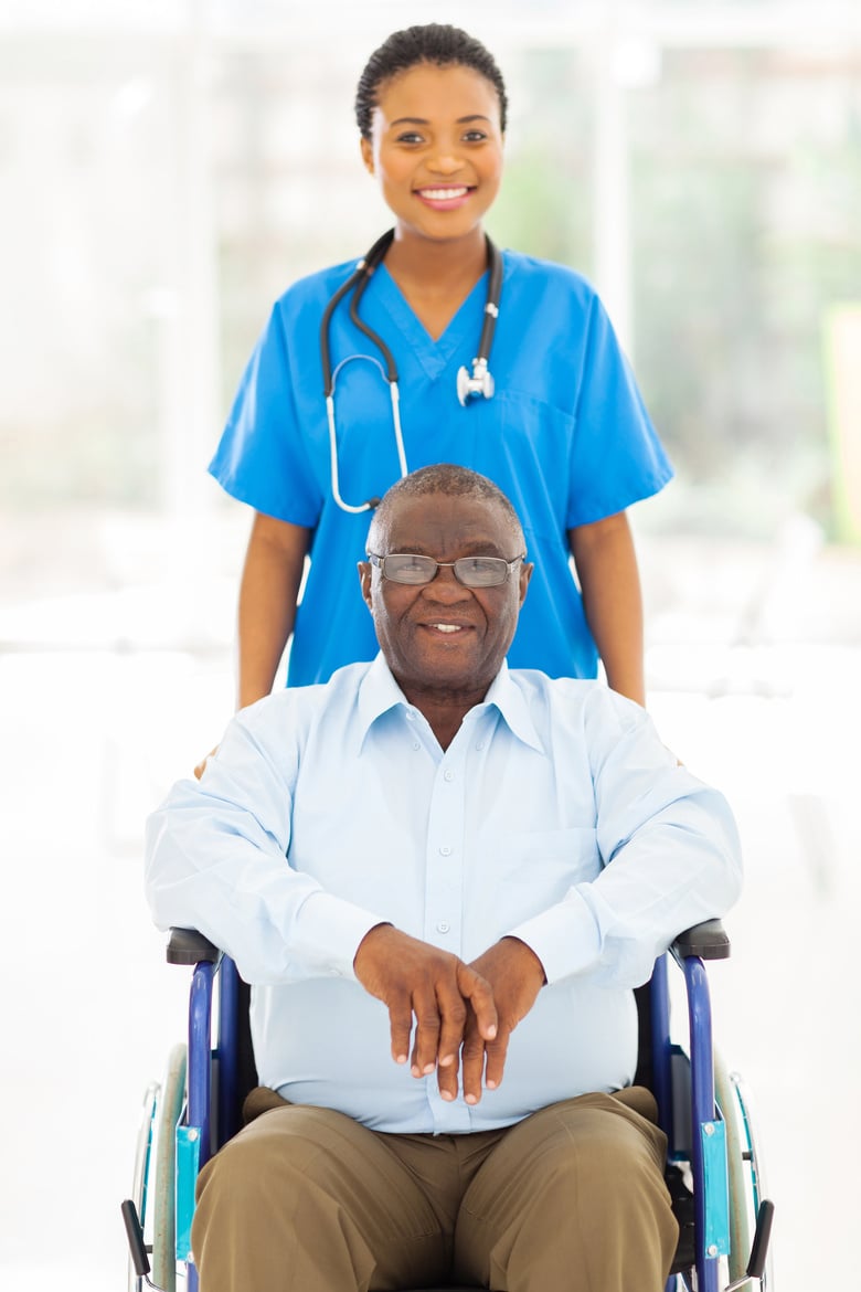 african health care worker and senior patient